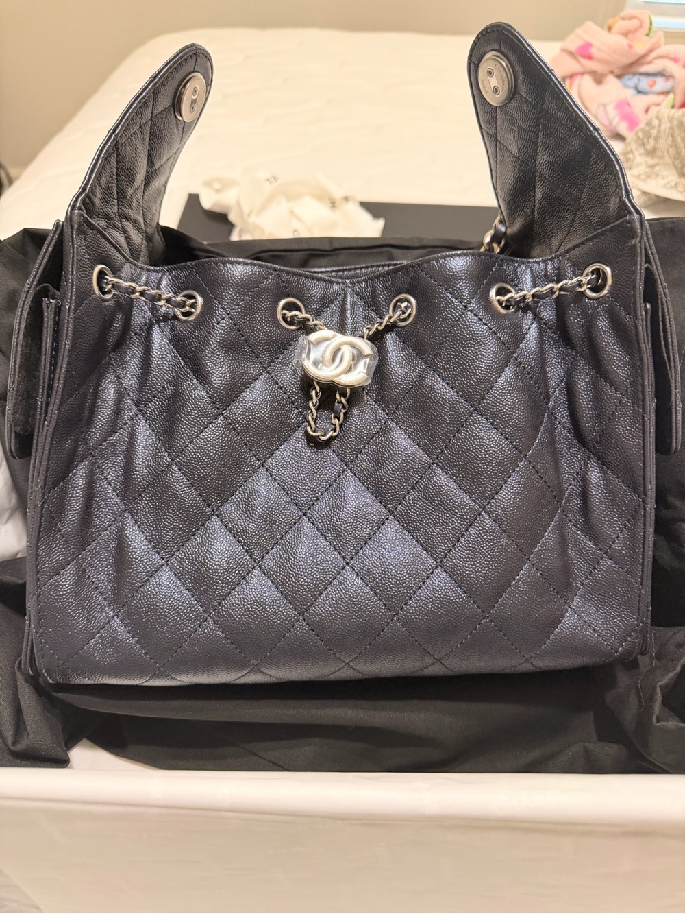 CHANEL Black Quilted Drawstring Shoulder Bag with Chain CC Accent
